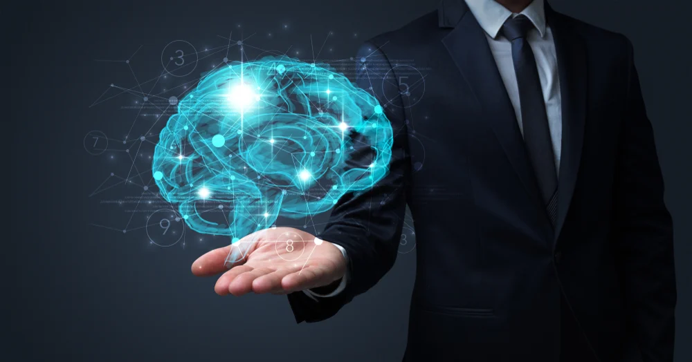 Businessman holding human brain on his hand with logistics symbols around 1