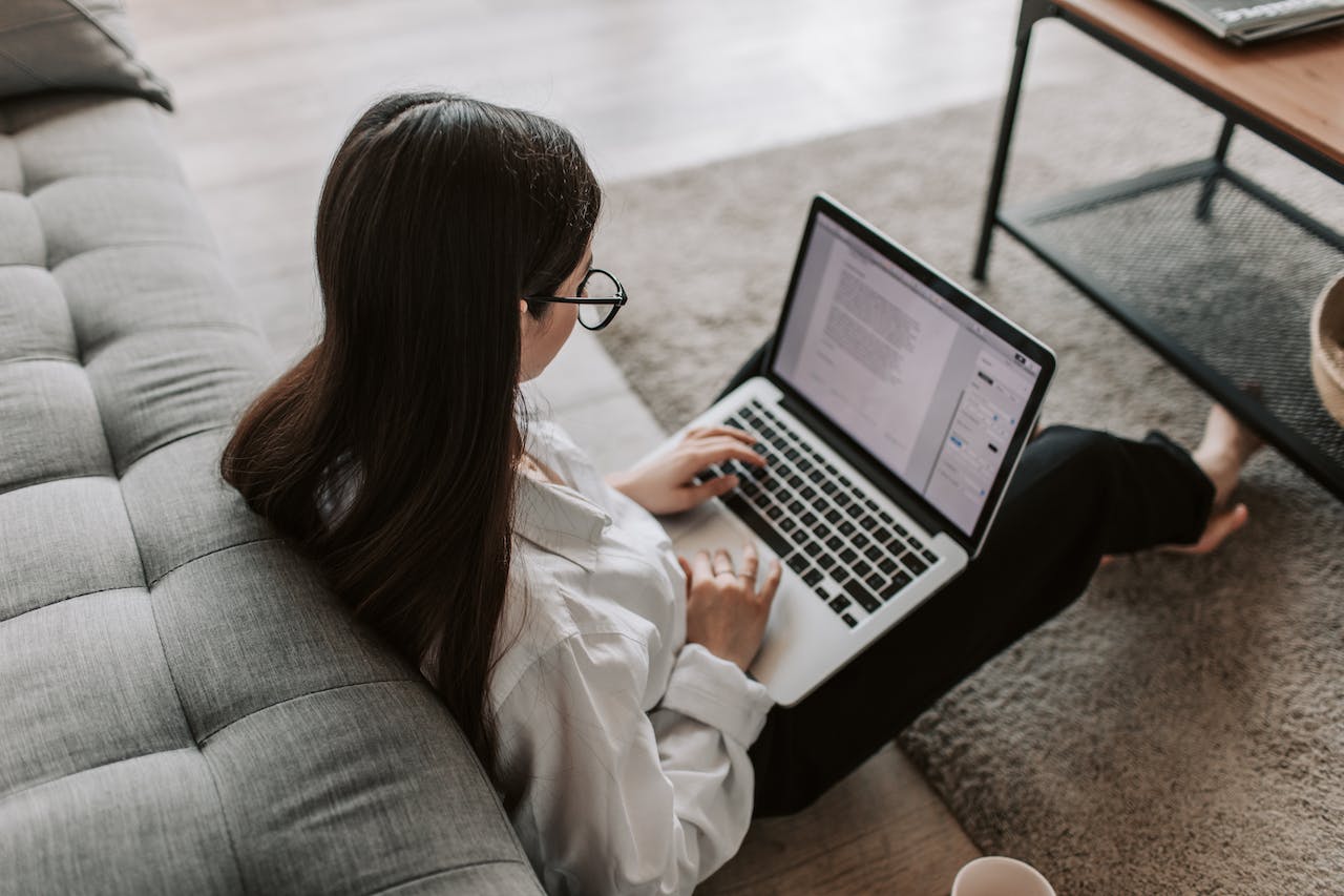A lady is using laptop